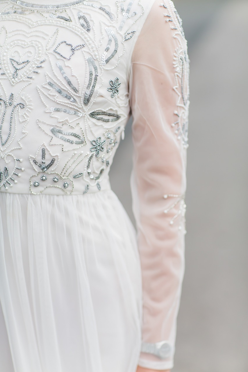 White dress with blue and silver beading