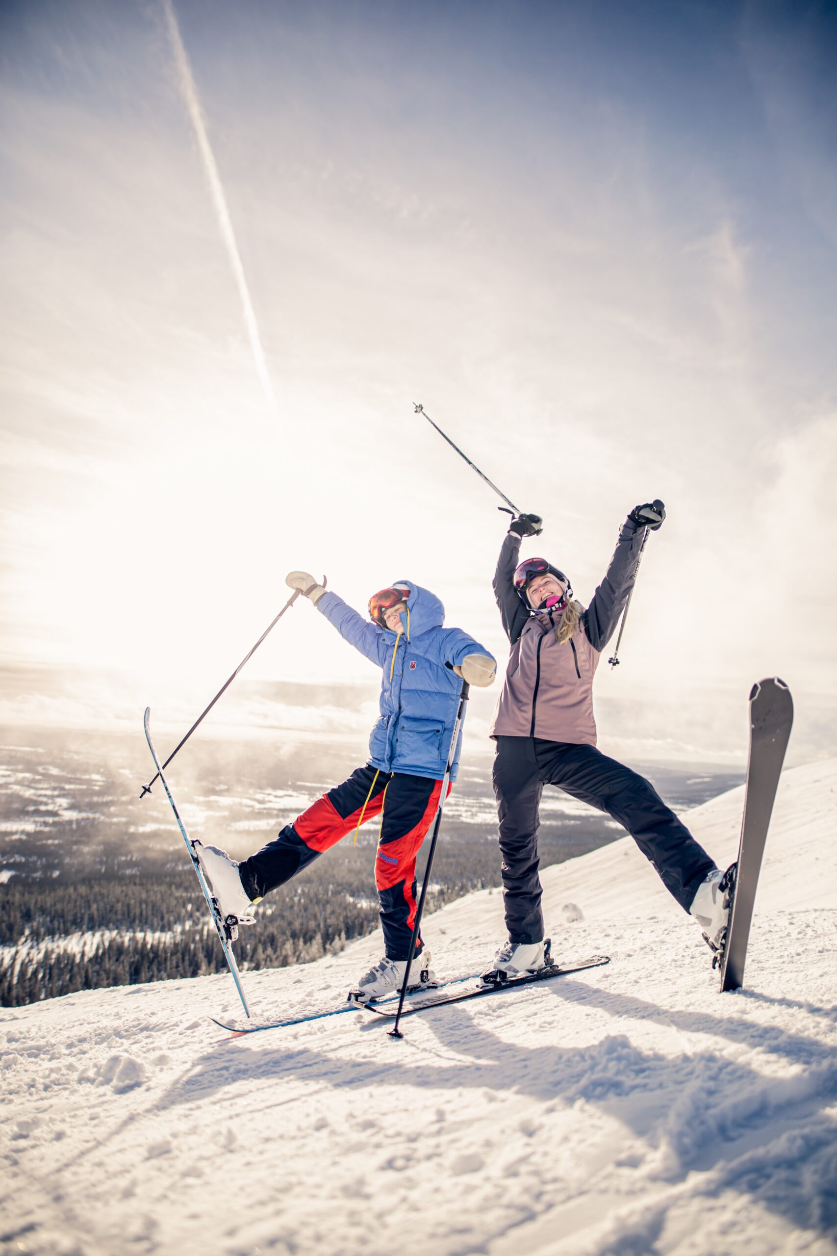 Two skiers in skiwear