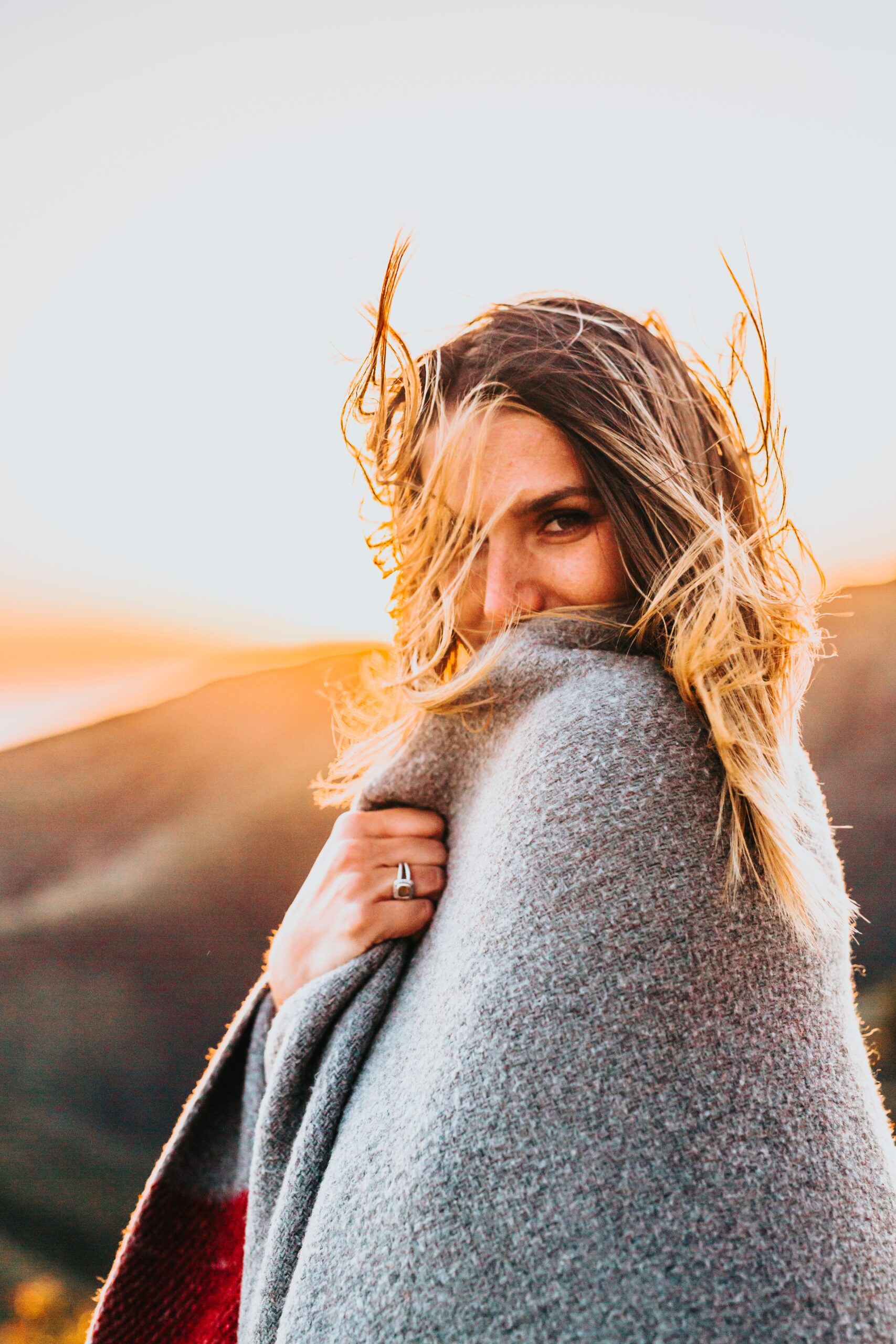 Woman wrapped in blanket