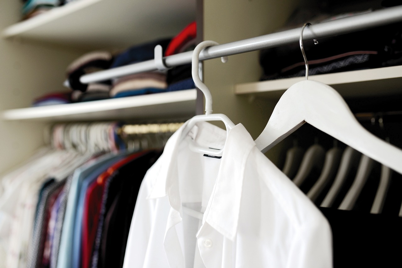 shirt on plastic hanger in closet