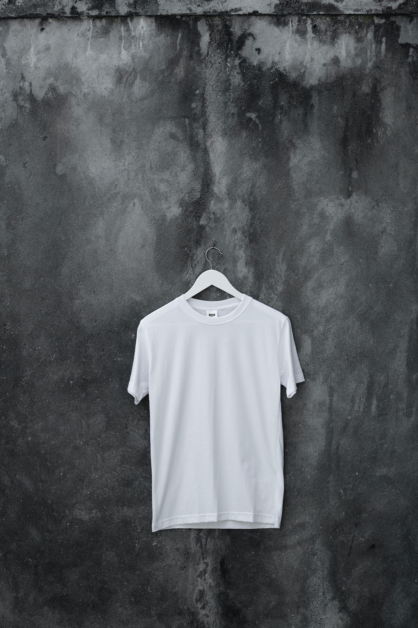 white crew neck tshirt on hanger